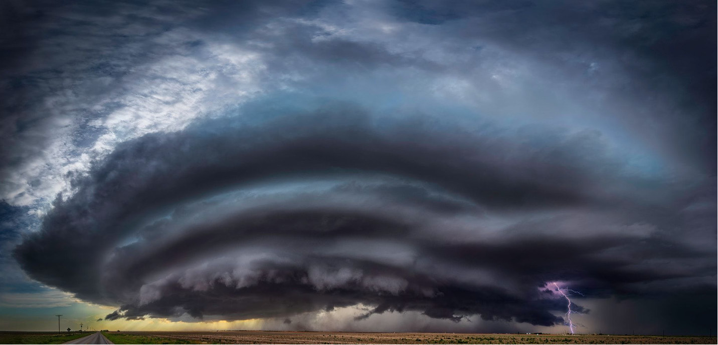 Dramatic storm clouds with lightning showing the extreme weather conditions InsulShield protects against